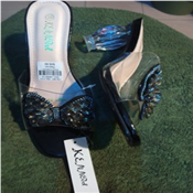 Lady’s black butterfly heel slippers